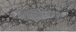 ground asphalt damaged 0003